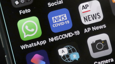 An iphone showing the NHS COVID-19 mobile phone contact tracing app.