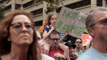 Thousands attended a rally at Town Hall in Sydney's CBD to demand action on climate change.