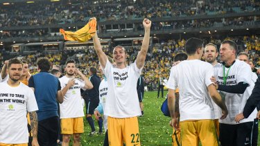 Glory daze: Jackson Irivne celebrates as the Socceroos qualify for the 2018 World Cup.