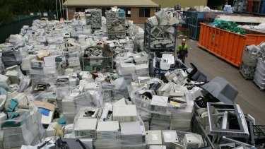 E-waste: masses of discarded computers and televisions at a recycling plant.