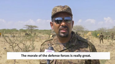 Ethiopian PM Abiy Ahmed, dressed in military uniform, speaks to a television camera at an unidentified location.