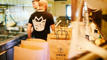 Uber Eats deliveries ready to go out the door at kebab chain Biggie Smalls.