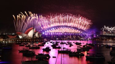 The New Year's Eve fireworks in Sydney harbour as seen from Mrs Macquarie's Point in Sydney on January 1, 2021.