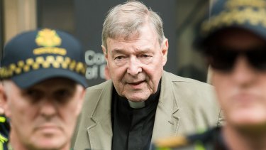 Cardinal George Pell leaves the County Court in Melbourne where was found guilty of historic sexual offences.
