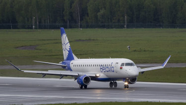 A Belavia plane lands at the International Airport outside Vilnius, Lithuania. 