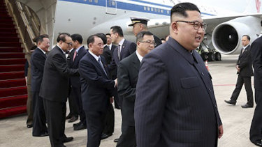 North Korean leader Kim Jong-un arrives at Changi International Airport on Sunday.