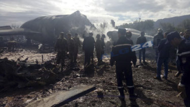 Algerian emergency services attend the crash.