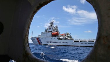 A Chinese coast guard ship attempts to block a Philippine government ship as the latter attempts to enter Second Thomas Shoal in the South China Sea to relieve Philippine troops and resupply supplies.