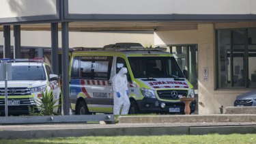 Ambulances outside St Basil's Home for the Aged in Fawkner where there has been a large COVID-19 outbreak.