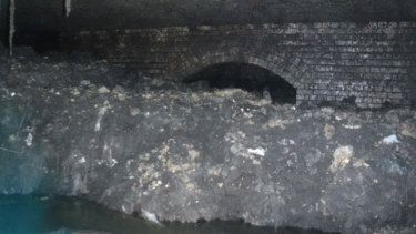 A "fatberg" made up of hardened fat, oil and baby wipes found in the sewer of the English town of Sidmouth.