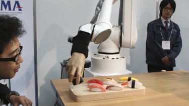 Automation and robots are likely to put even more pressure on middle-income earners, according to the OECD.
