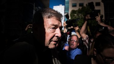 Cardinal George Pell arriving at the Melbourne County Court for sentencing in 2018. 