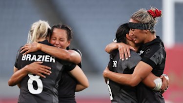 New Zealand celebrate after defeating France to win gold in rugby sevens.