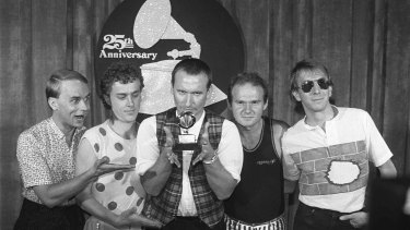 Men at Work pose with their Best New Artist Grammy in 1983.