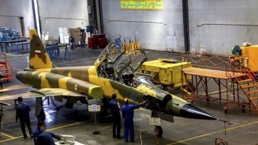 Technicians work on Kowsar domestically-built fighter jet production line at an undisclosed location, Iran.