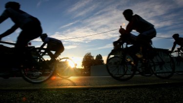 Dawn patrol: cyclists on Melbourne's Beach Road. 