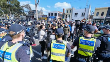 Dozens of police descended Queen Victoria market after anti-lockdown protesters marched through the iconic site as part of a 'Freedom Day' protest. 
