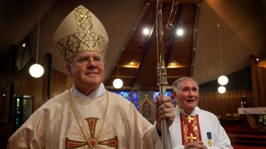 Australian Catholic Bishops Conference president Archbishop Mark Coleridge, left, will release the Australian Catholic Church's response to the child abuse royal commission on Friday.
