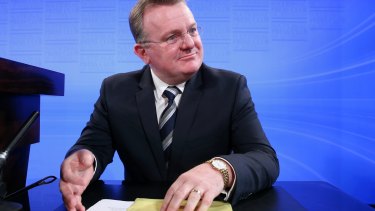Small Business Minister Bruce Billson commenced taking a salary from the Franchising Council of Australia before he had left parliament.