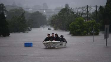 Residents try to evacuate the areas around Lismore, NSW.