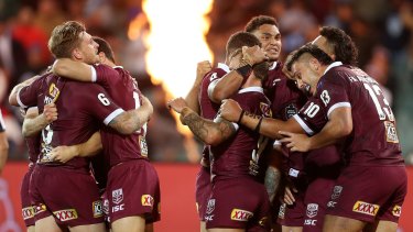 The Maroons celebrate winning game one of the 2020 State of Origin series between the Queensland Maroons and the New South Wales Blues at the Adelaide Oval.
