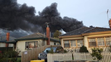 Fire crews battle to control a blaze at a factory in West Footscray, Melbourne.