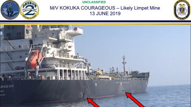 The US military's Central Command shows damage and a suspected mine on the Kokuka Courageous in the Gulf of Oman near the coast of Iran. 