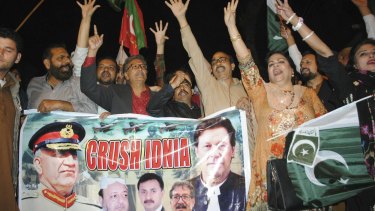 Pakistani protesters shout anti-Indian slogans in Hyderabad, Pakistan, on Tuesday.