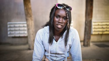 Akiir Muo, the girlfriend of James Gargasoulas, outside his mother's home in Windsor.