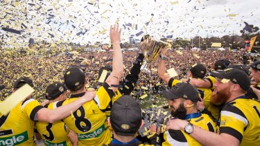 The premiership cup raised at Punt Road Oval in 2017.