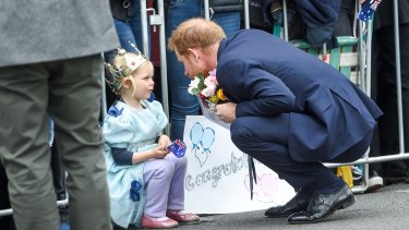 Prince Harry meets a little princess. 