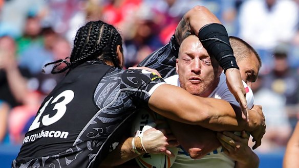 No more: New Zealand's Martin Taupau tackles England's James Roby during the one, and it now seems, only Denver Test.