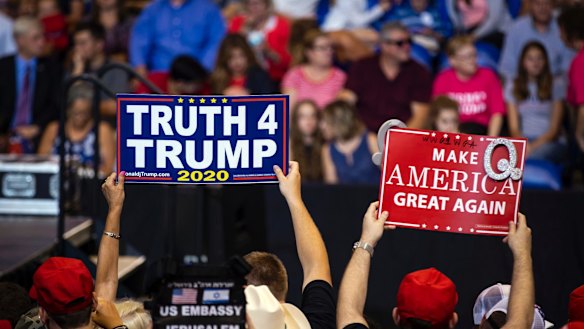 QAnon followers believe Q is an intelligence or military insider and Donald Trump is working tirelessly to thwart evil.