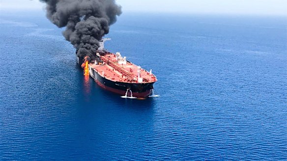 An oil tanker is on fire in the sea of Oman.