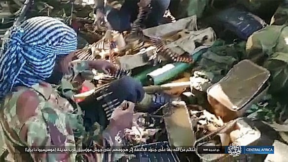 Rebel fighters and weapons after clashes with Mozambique forces last year.