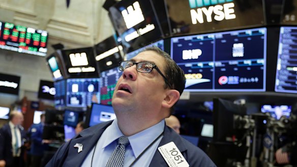 A trader on the floor of the New York Stock exchange. The US Federal Reserve increased interest rates last week. 