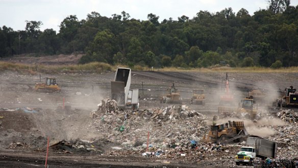 Queensland waste trucks dump unprocessed construction waste from NSW at Cleanaway's New Chum landfill in Ipswich.