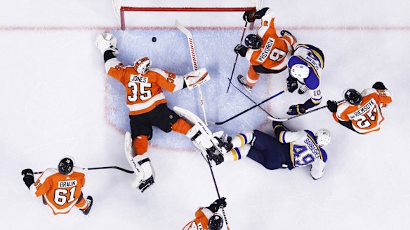 St. Louis Blues’ Brayden Schenn (10) scores on the Philadelphia Flyers in an NHL hockey game.