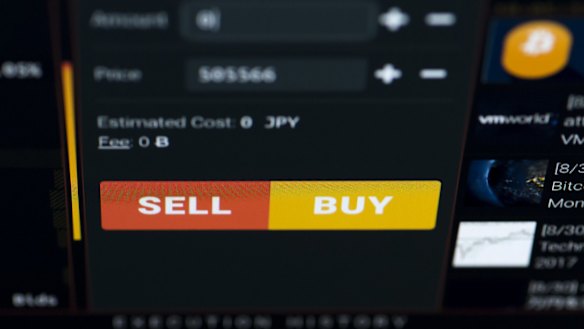 A bitcoin trading page is displayed on a computer monitor via software for trading virtual currencies.