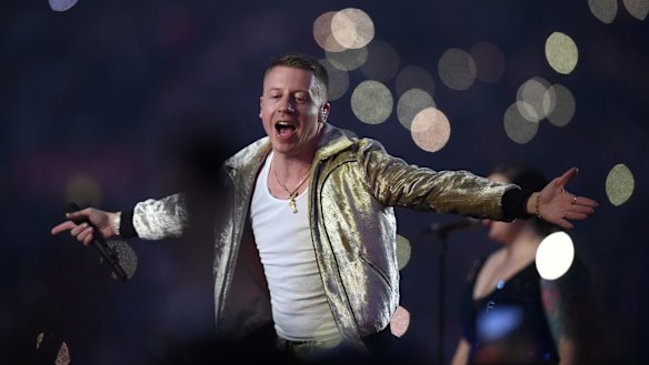Love game: US artist Macklemore performs during the NRL grand final. 