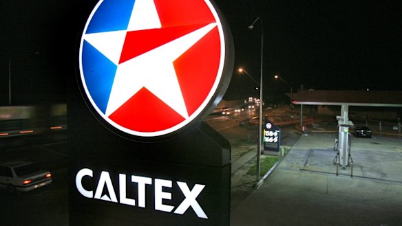 Caltex has had a bad six months due to sluggish consumer spending and falling refinery margins.
