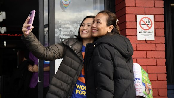 Independent candidate for Fowler Dai Le (right) in Cabramatta on Saturday.