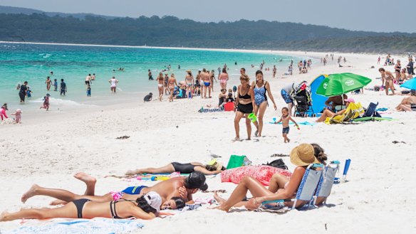 Hyams Beach has been promoted as having some of the world's whitest sand, but has become a victim of its own success. 