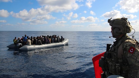 The conflict in Libya has forced thousands of people to flee in search of a better life in Europe. Here, migrants are picked up by the Turkish military on January 29 and returned to the Libyan Coast Guard.