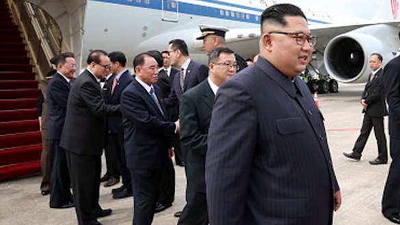 North Korean leader Kim Jong-un arrives at Changi International Airport on Sunday.