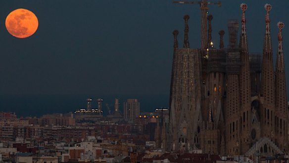 Barcelona’s Sagrada Familia Basilica is backdropped by a super blood moon in January 2018.