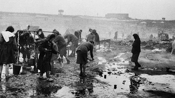 Female inmates at Bergen-Belsen concentration camp in Germany, shown in an official British photo from April 1945.