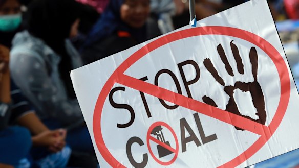 Thai protesters gather near the government house to protest the construction of a coal-fired power plant in Bangkok earlier this year.