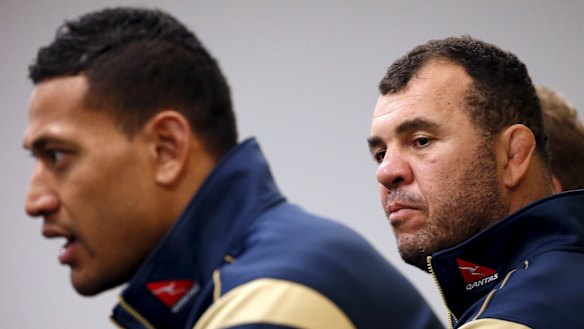 Better days: Israel Folau and Michael Cheika in 2015. 