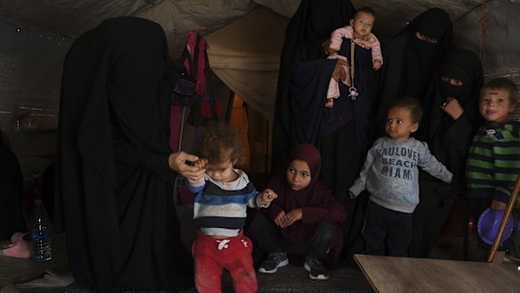 Australians at al-Hawl watch as one-year-old Obeid takes some of his first steps. 